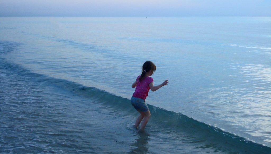 girl-is-jumping-in-a-cold-water